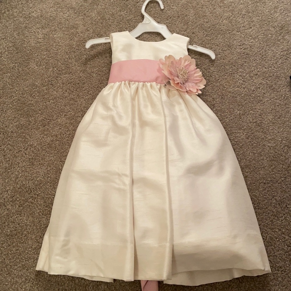 Gorgeous (new) ivory dress with a pink bow! Never worn!